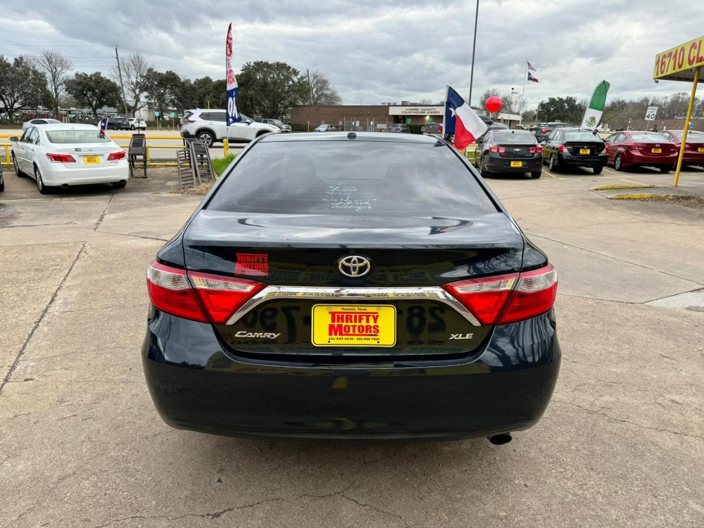 2016 Toyota Camry (4T1BF1FKXGU) , located at 16710 Clay Rd., Houston, TX, 77084, (281) 859-7900, 29.834864, -95.656166 - Photo#2